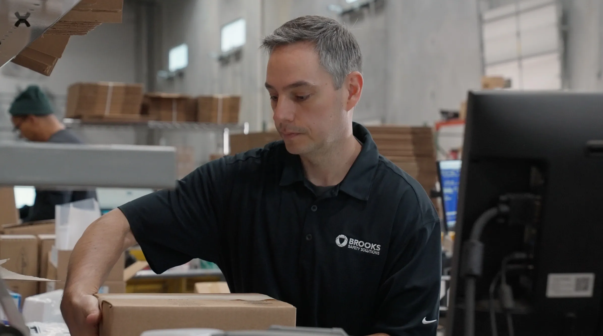 Technician servicing kitchen equipment