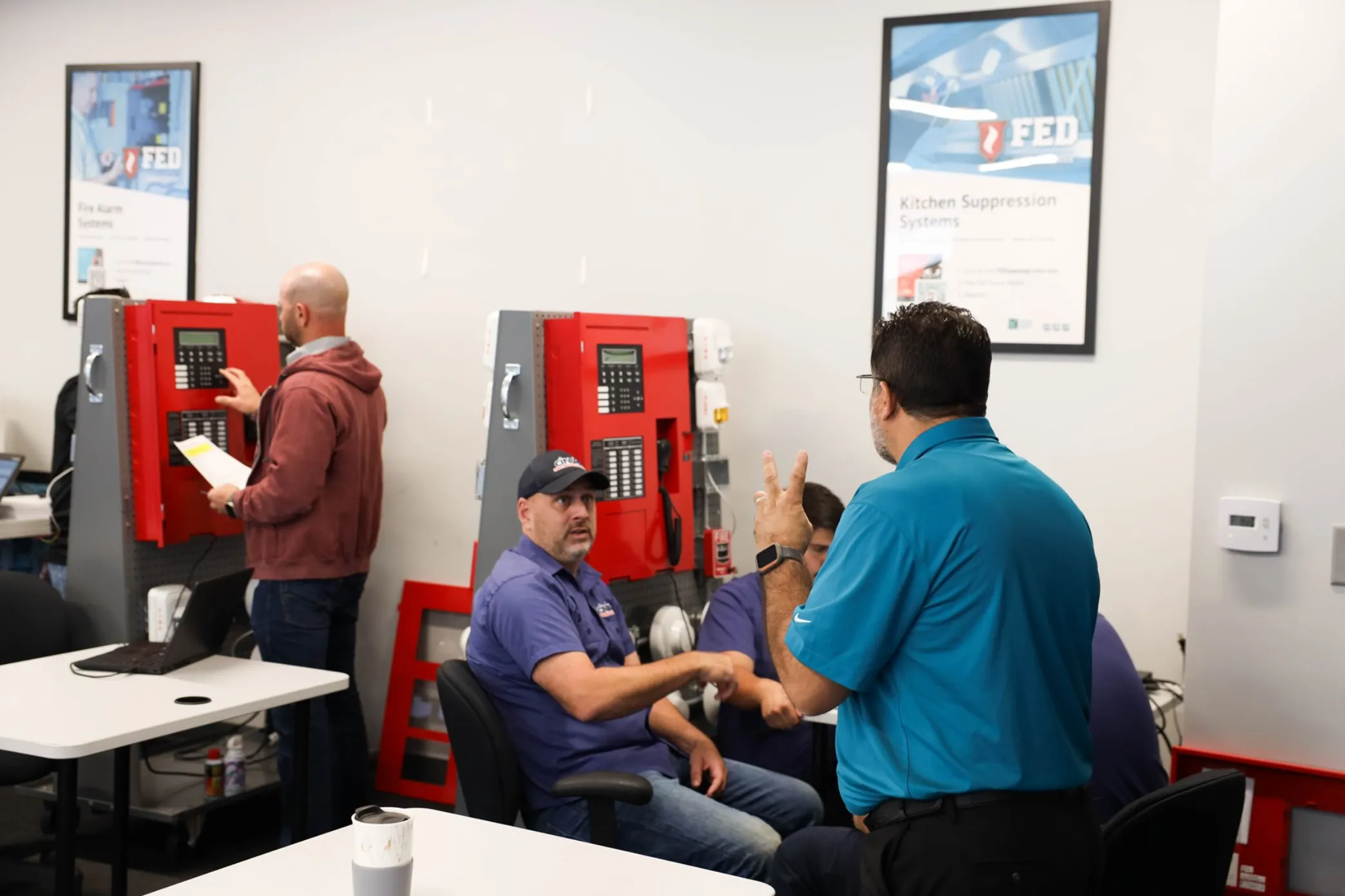 Technician servicing kitchen equipment